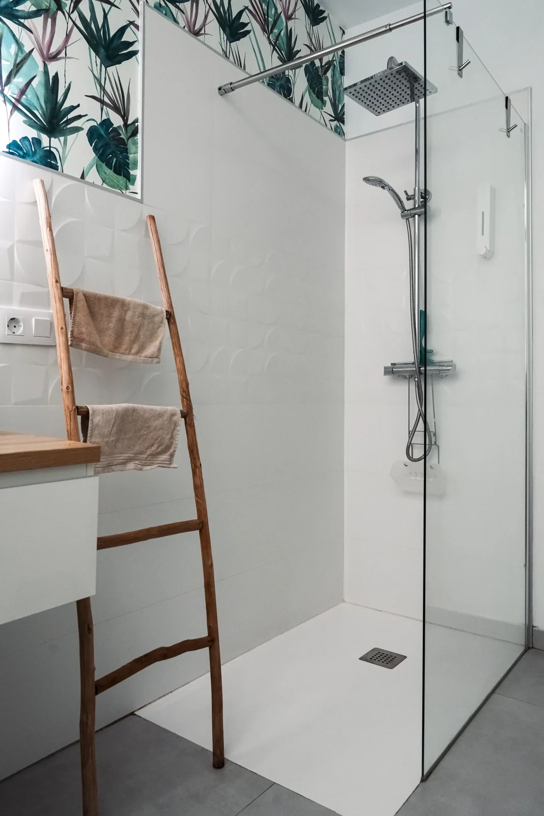 A sleek and modern bathroom with a tropical theme in Lanzarote, Spain