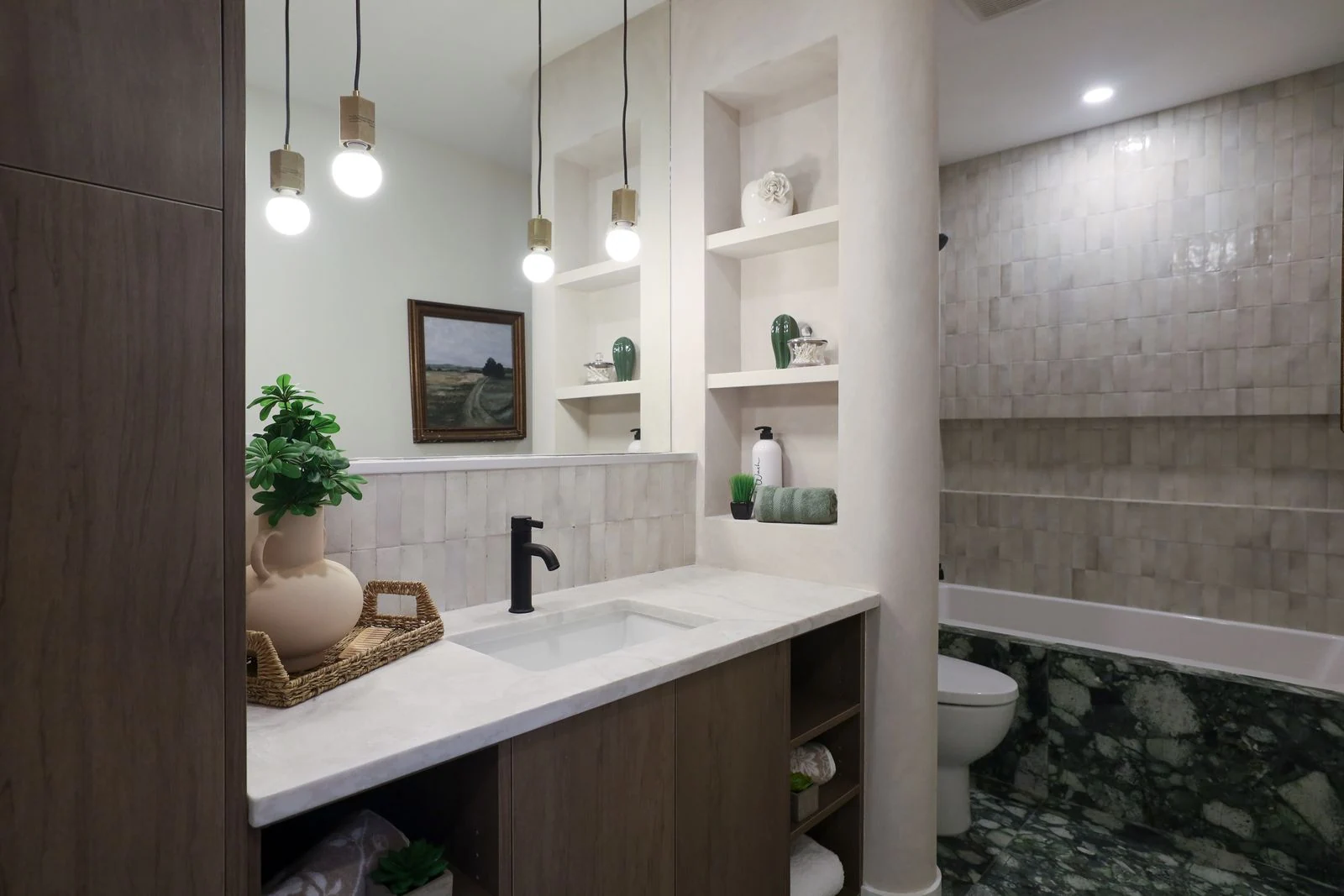 Stylishly designed bathroom showcasing modern fixtures and elegant decor in a minimalistic style