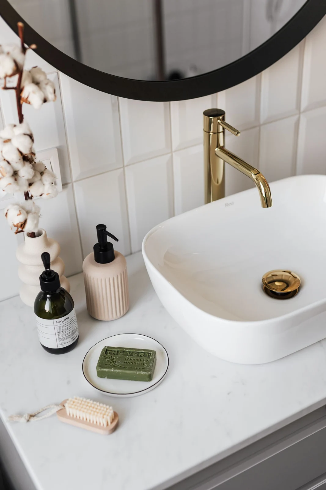 Basin and brass bathroom tap