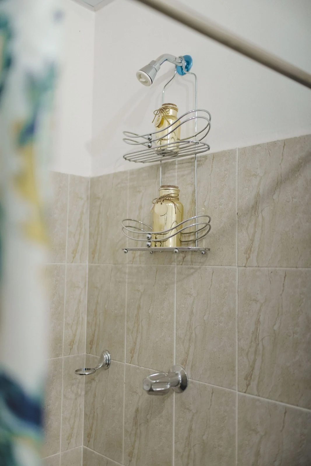 Shower enclosure with gold fittings