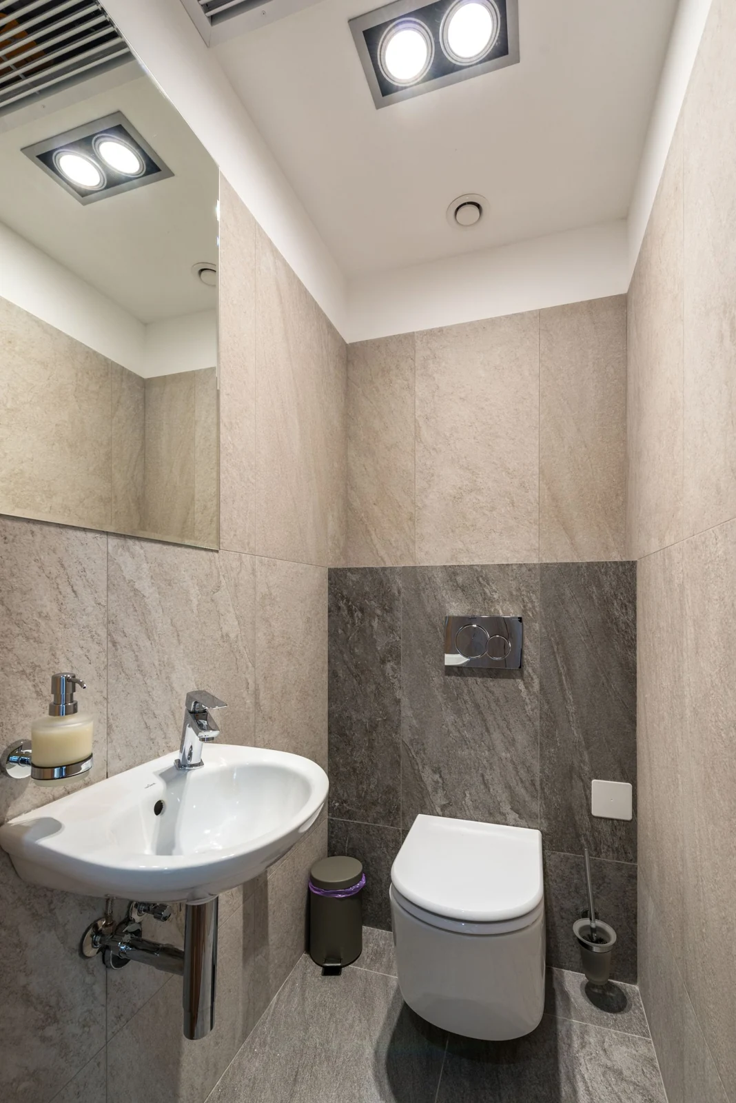 Pedestal basin in a tiled bathroom