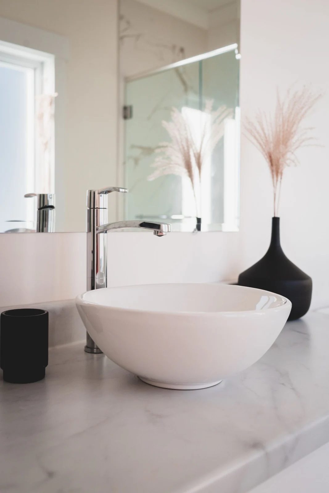 Round basin and bathroom tap